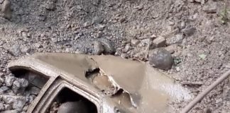 Derrumbe sepulta auto y mueren dos adultos mayores Tutotepec