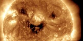 Insólita cara sonriente del sol