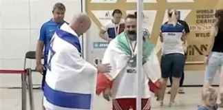 Suspende federación al pesista iraní Mostafa Rajai por dar la mano a pesista israelí