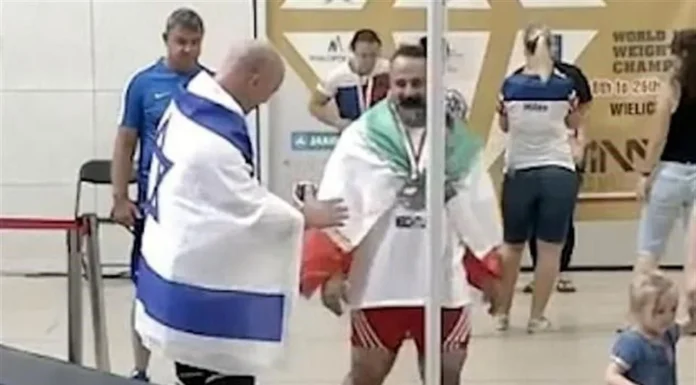 Suspende federación al pesista iraní Mostafa Rajai por dar la mano a pesista israelí