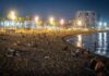 Turistas duermen en playas de Barcelona ante el alto costo de hospedaje